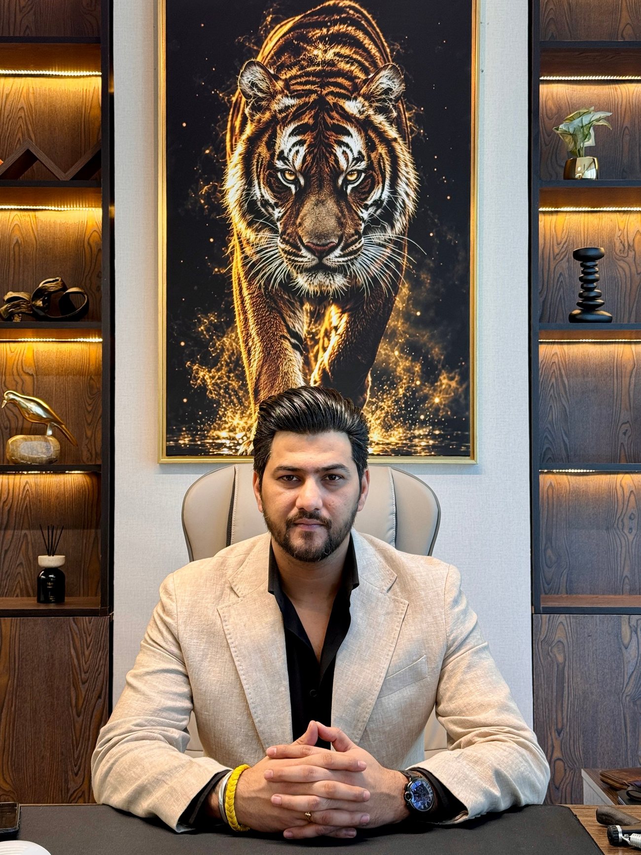 Amit Thakur, Founder and CEO, at his desk